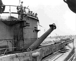 American sailors examine a U-boat's snorkel