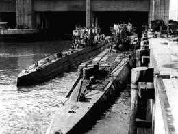 U-953 type VIIC (OL Herbert Werner) on the left and U-851 Type IXD2 (KK Jurgen Oesten) docked...