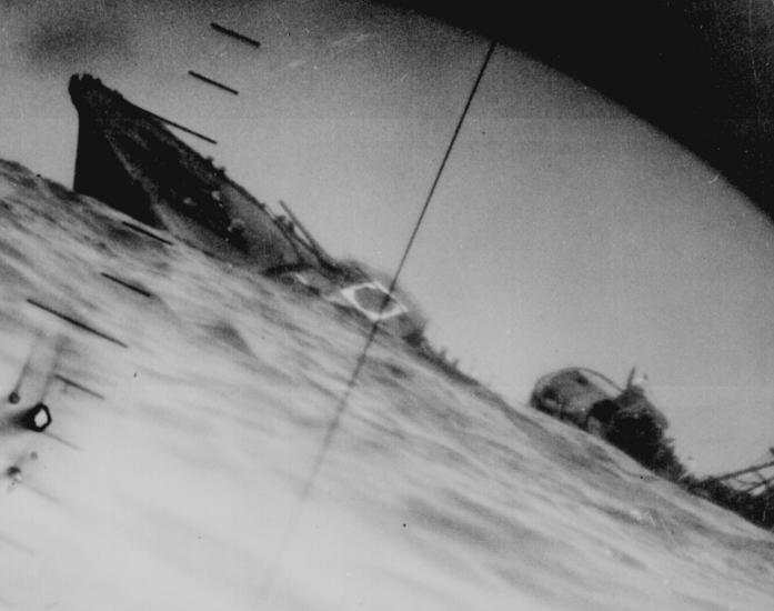 Periscope view of a sinking destroyer from a US sub in the Pacific.