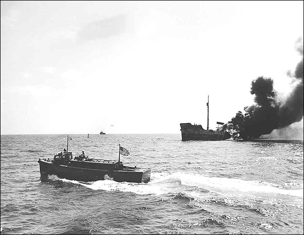 A burning tanker off the American coast during the U-Boat "Second Happy time".