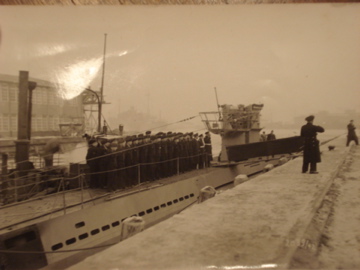 U-410 before her commissioning ceremony 23 Feb 1942. There's an inscription in the...