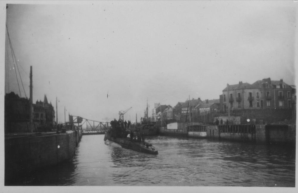 A U-boat entering St. Nazaire by way of the  Nouvelle cluse (New floodgate). Photos...