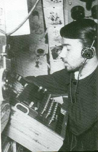 A crew aboard U-110 operates the Enigma machine.