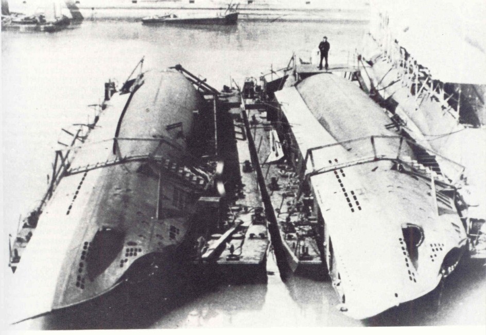 U-19 and U-23 lying alongside in the dockyard for assembly.