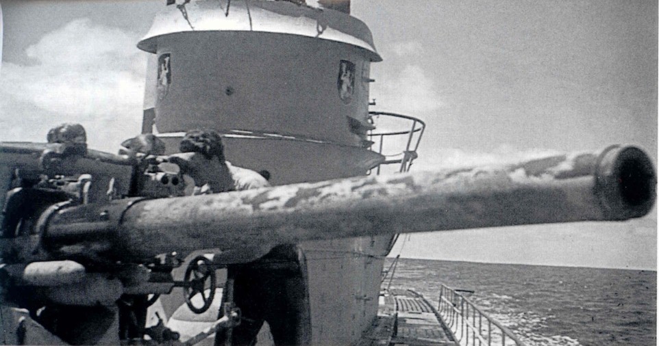 U-172, discernible by the emblem. Excellent shot of the gunner peering into the gunsight. 